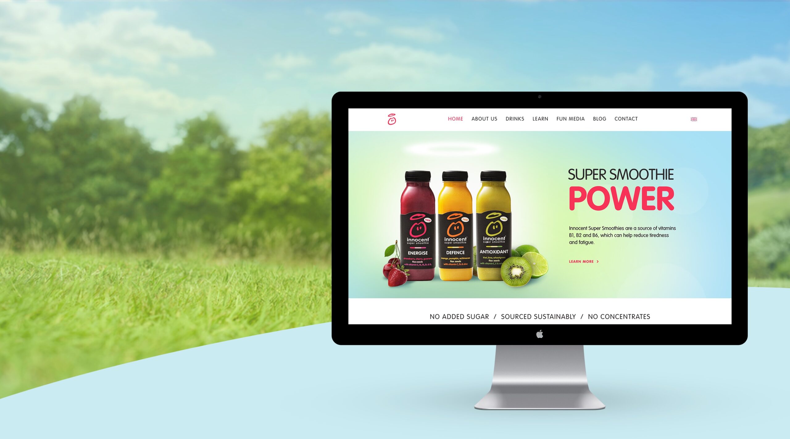 Hero image featuring Innocent Drinks Home page design on the screen of imac